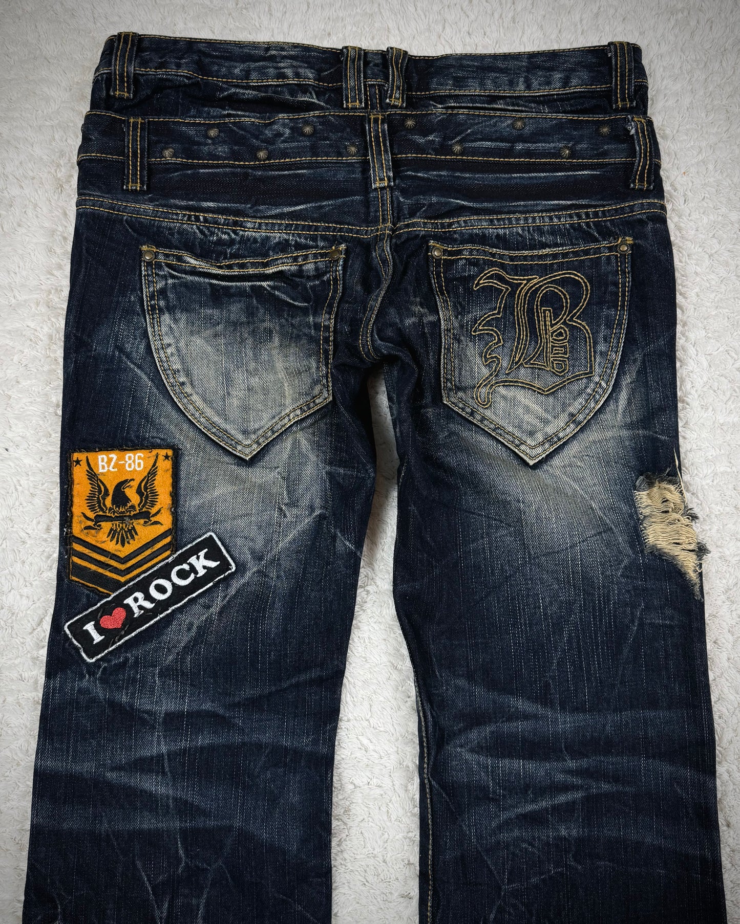 Buzz Spunky Double Waisted Lace Up Studded Patched Bootcut Denim