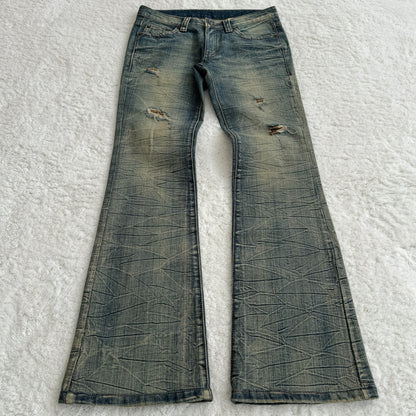 Agate Pierced Mud Wash Flared Jeans