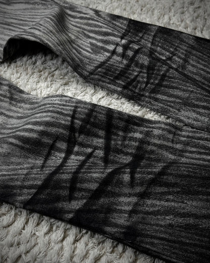 Tornado Mart Clawmarks Zebra Coated Flared Pants