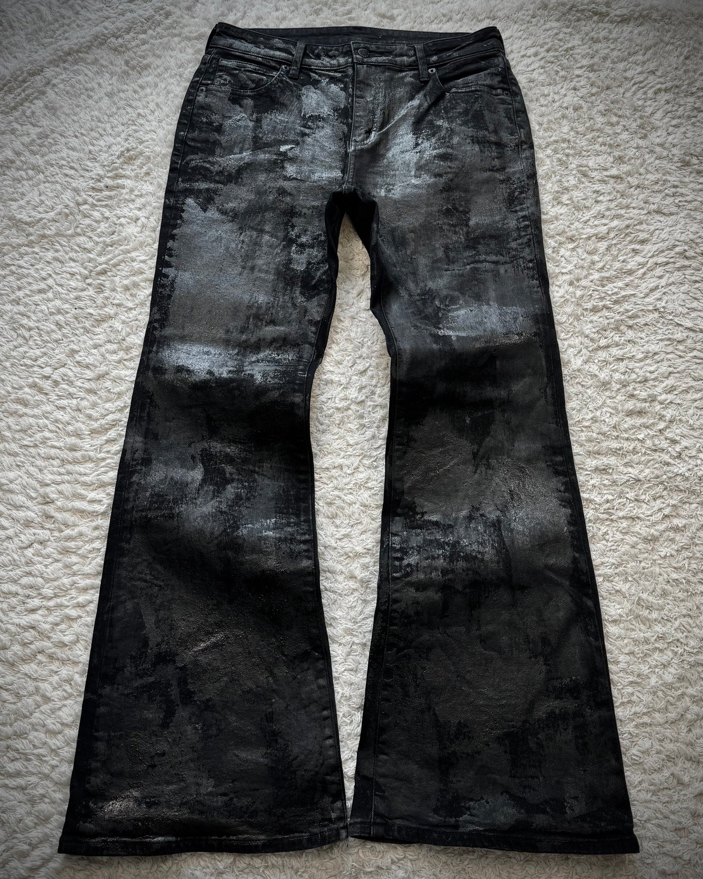 G.U. Heavy Wax Coated Flared Jeans