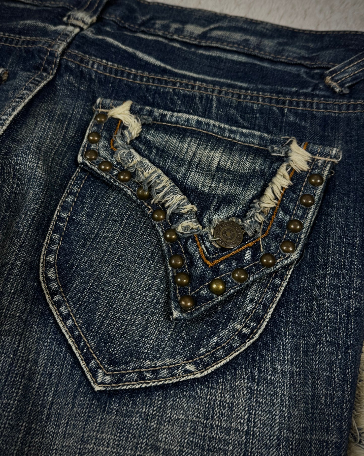 Tornado Mart Spiral Fringe Flared Jeans