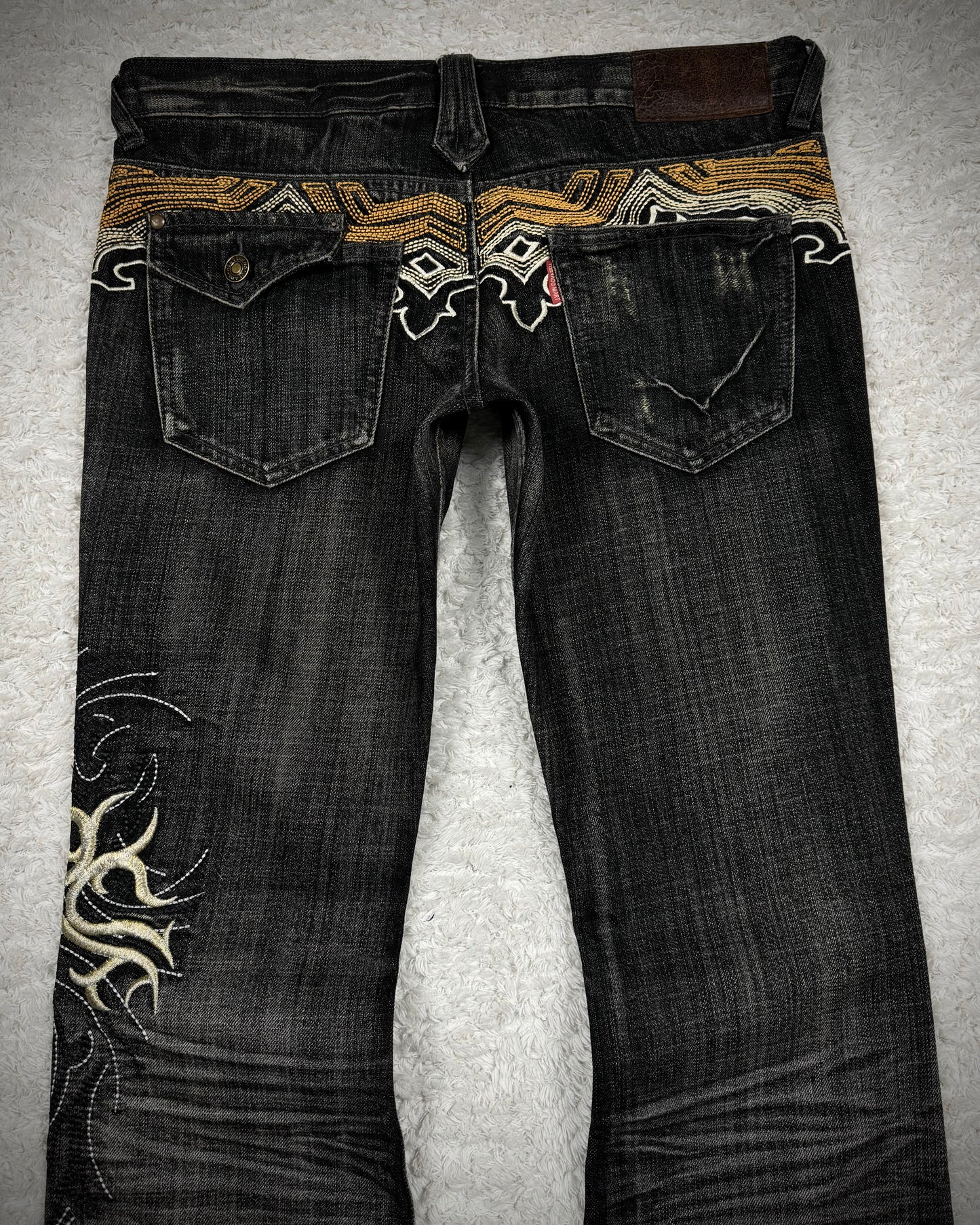 Tornado Mart Cyber Tribal Embroidery Flared Jeans