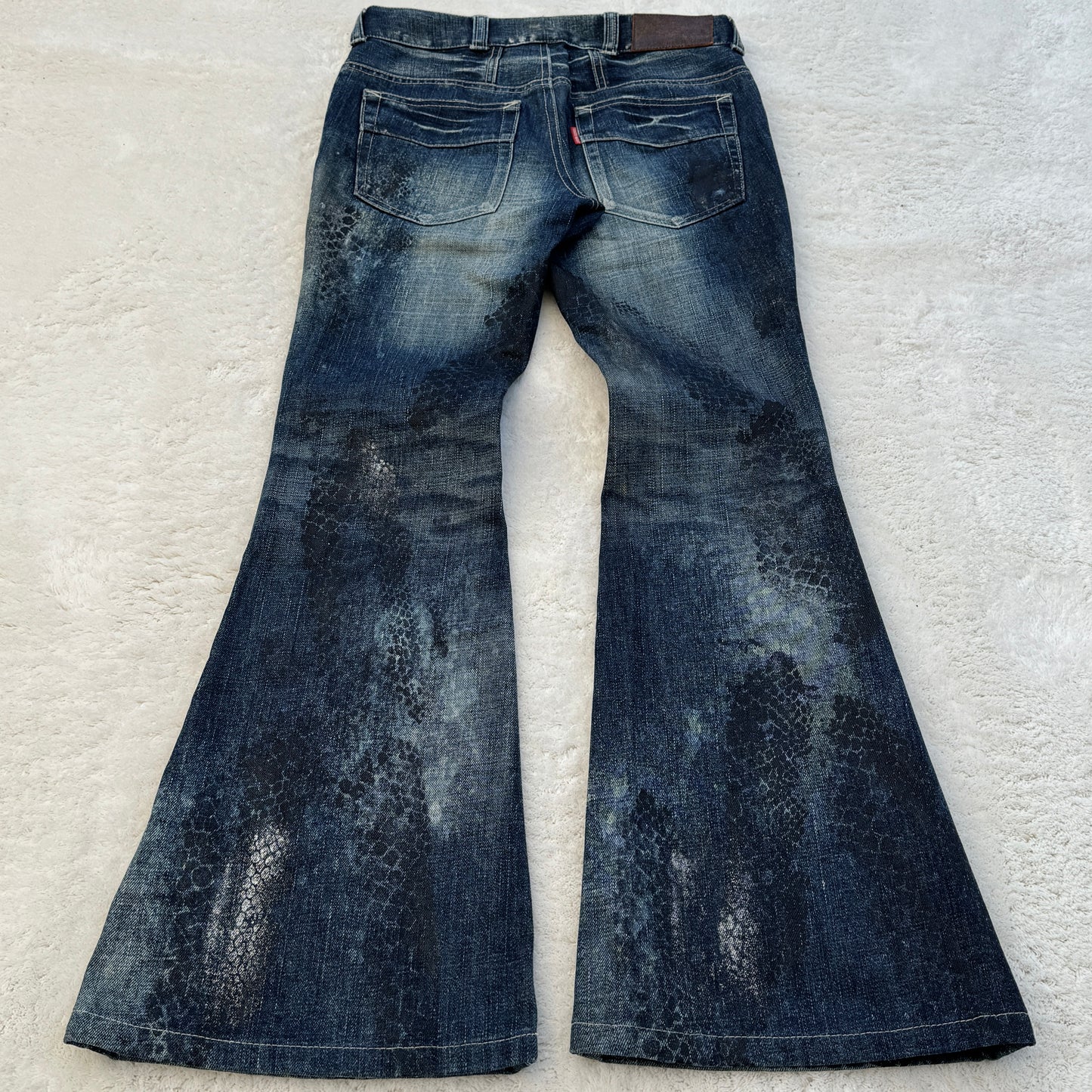 Tornado Mart Flared Snakeskin Printed Jeans