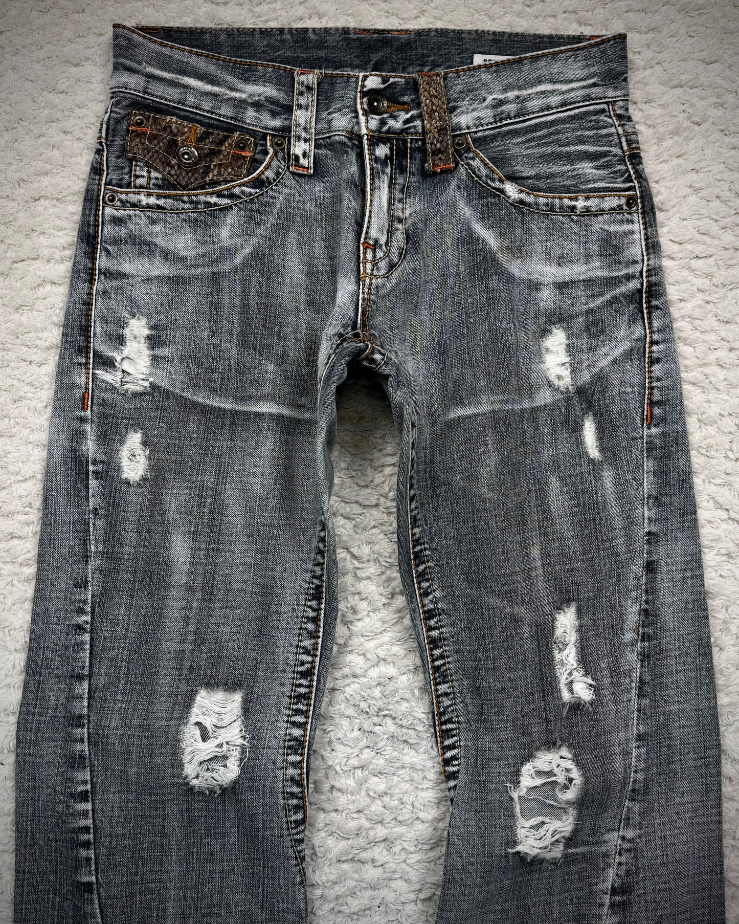 Semantic Design Python Flaps Spiral Flared Jeans
