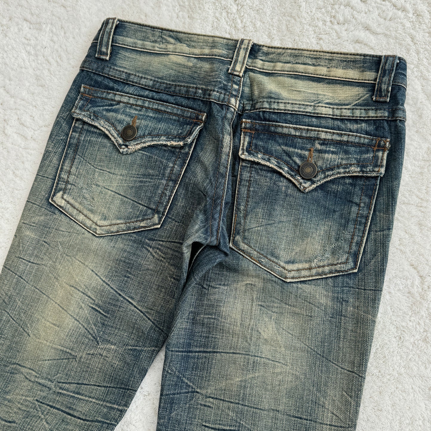 Agate Pierced Mud Wash Flared Jeans