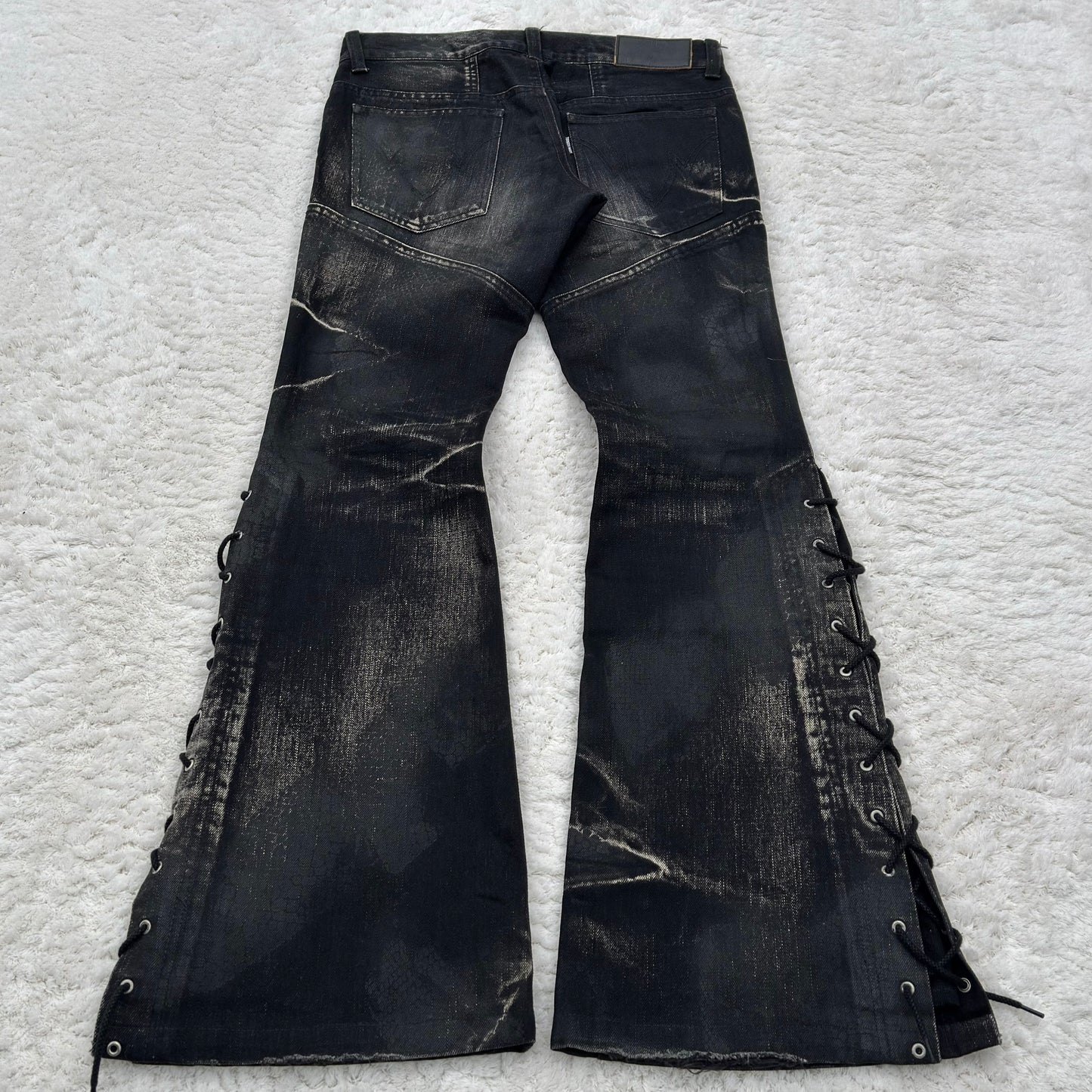 Tornado Mart Snakeskin Imprinted Flared Lace-Up Jeans