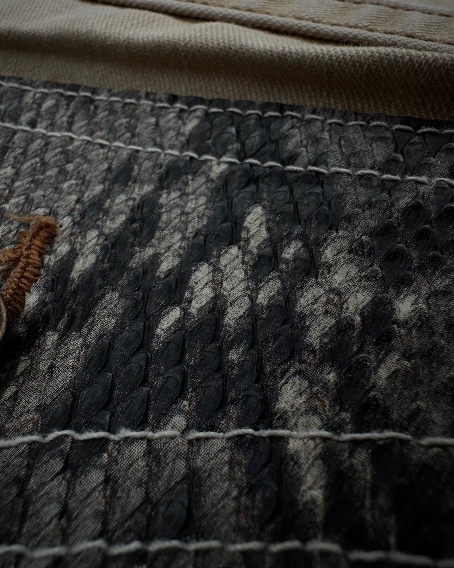 Semantic Design Sand Washed Python Detailed Flared Jeans
