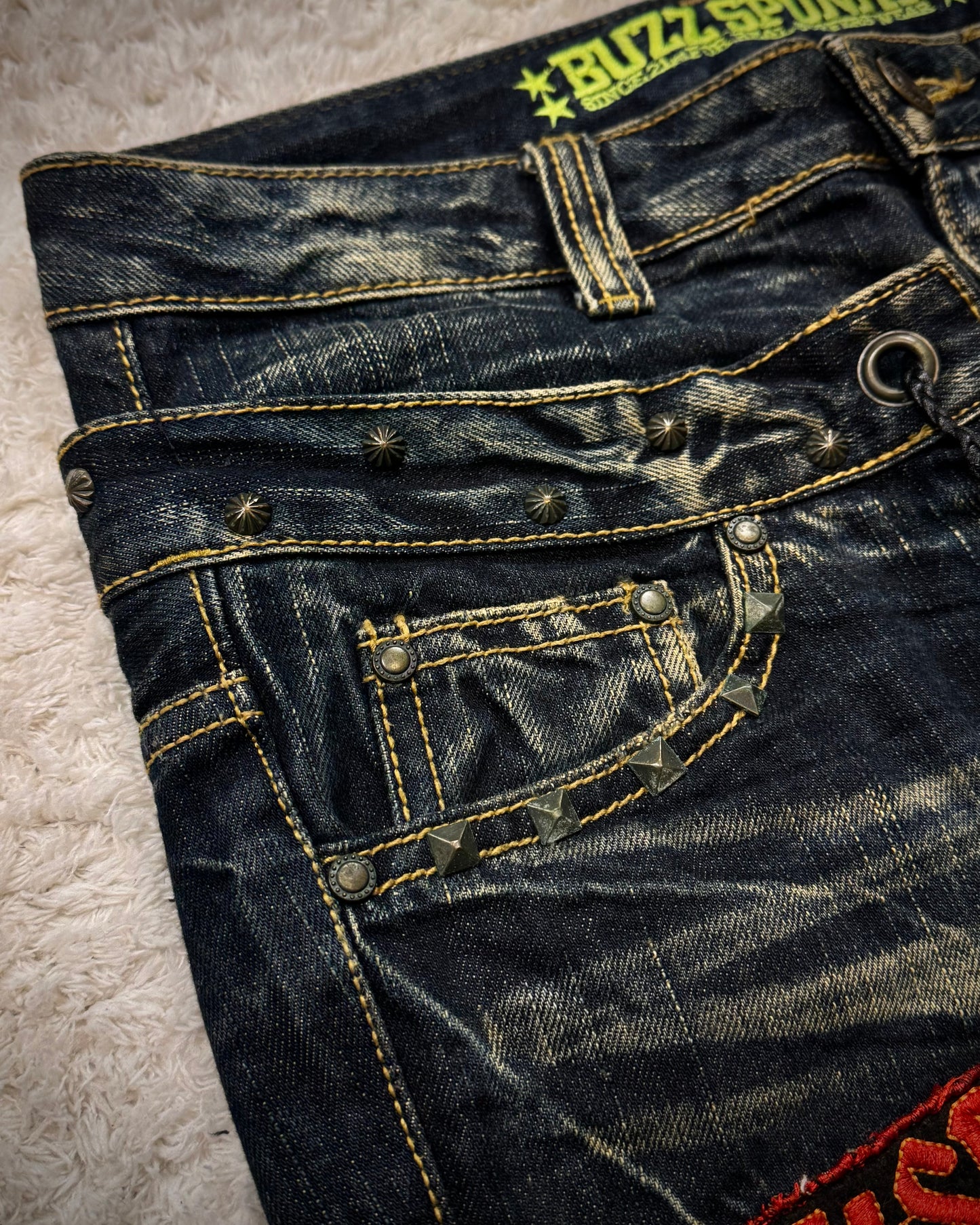 Buzz Spunky Double Waisted Lace Up Studded Flared Jeans