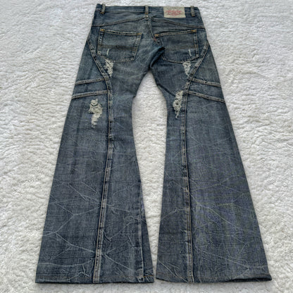 Tornado Mart Distressed Cracked Wash Flared Jeans