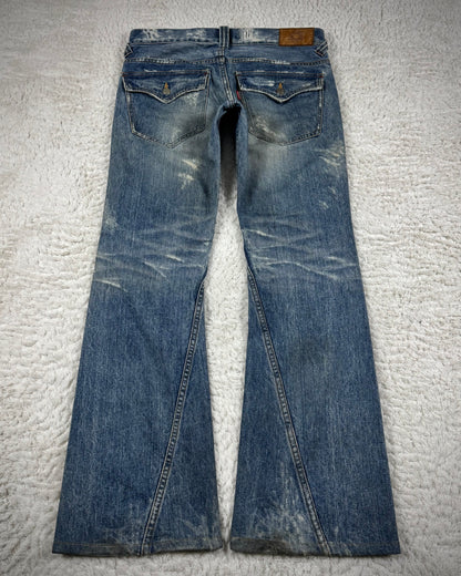 Tornado Mart Repaired Distressing Spiral Flared Jeans