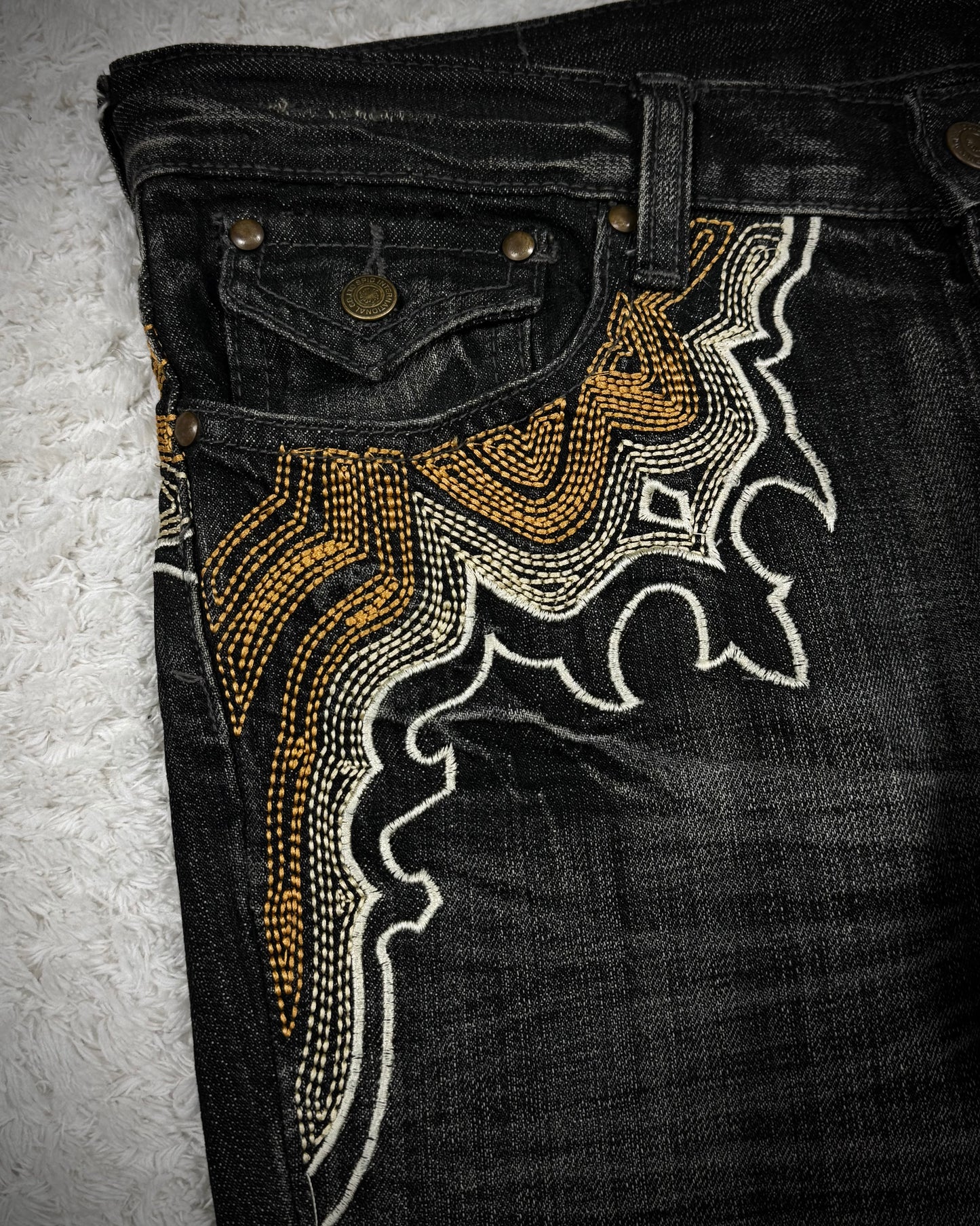 Tornado Mart Cyber Tribal Embroidery Flared Jeans