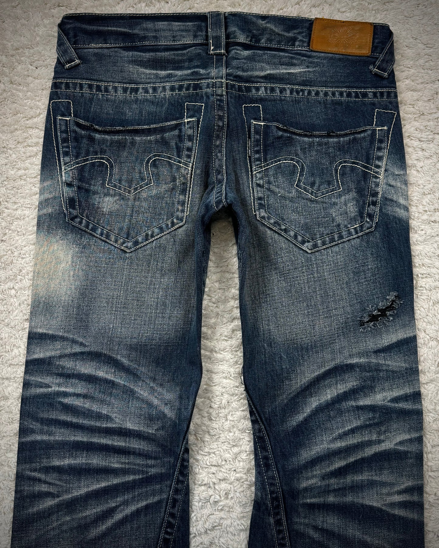 Tornado Mart Stitch Repaired Clawmarks Washed Spiral Flared Jeans
