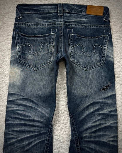 Tornado Mart Stitch Repaired Clawmarks Washed Spiral Flared Jeans