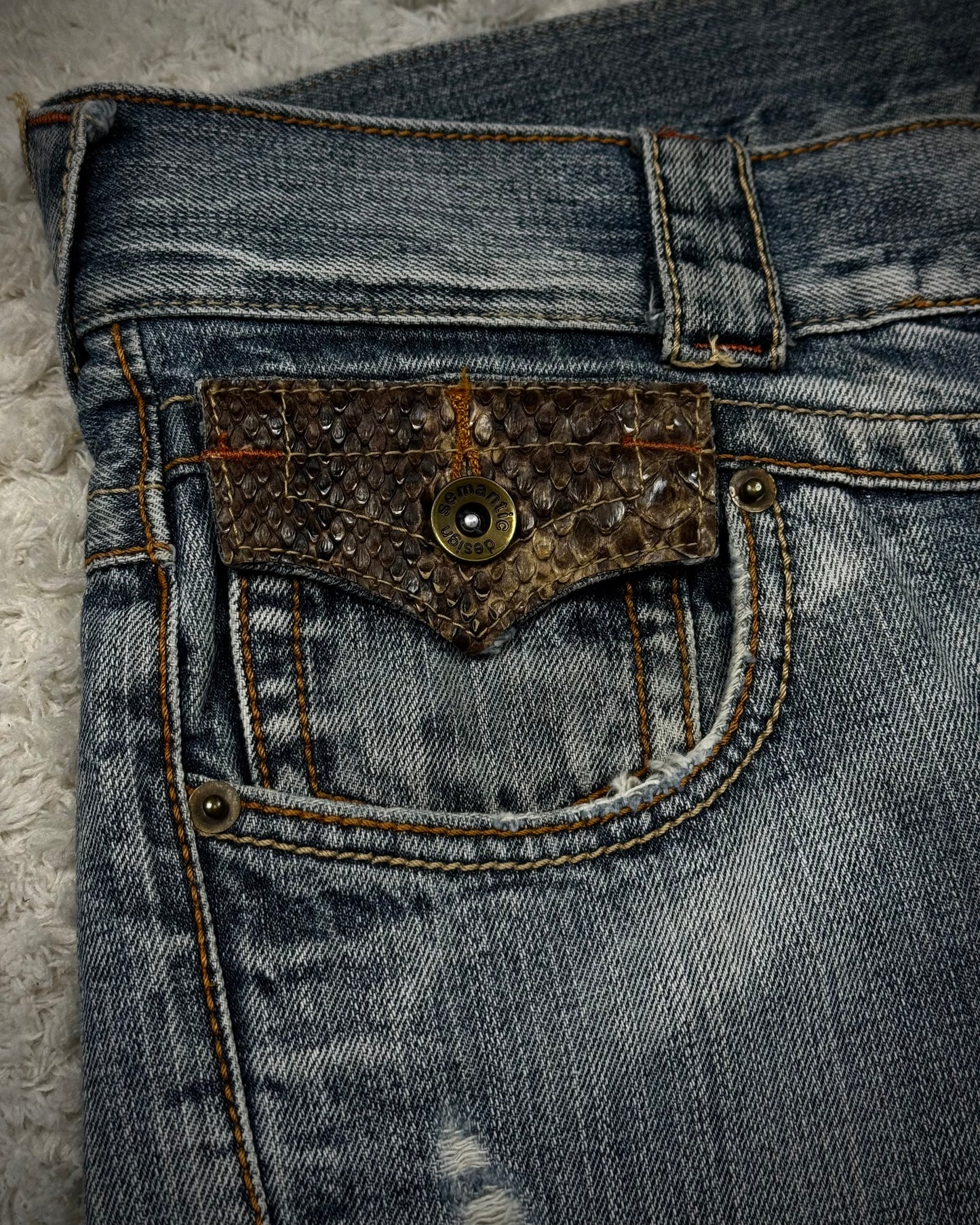 Semantic Design Python Detailed Spiral Flared Jeans