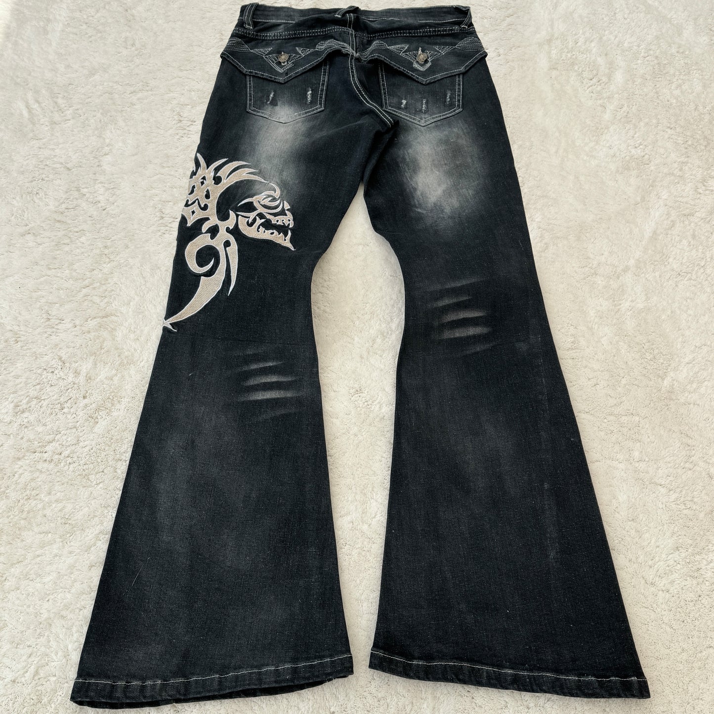 NOT Tornado Mart „Skull Tribal“ Embroidery Flared Jeans