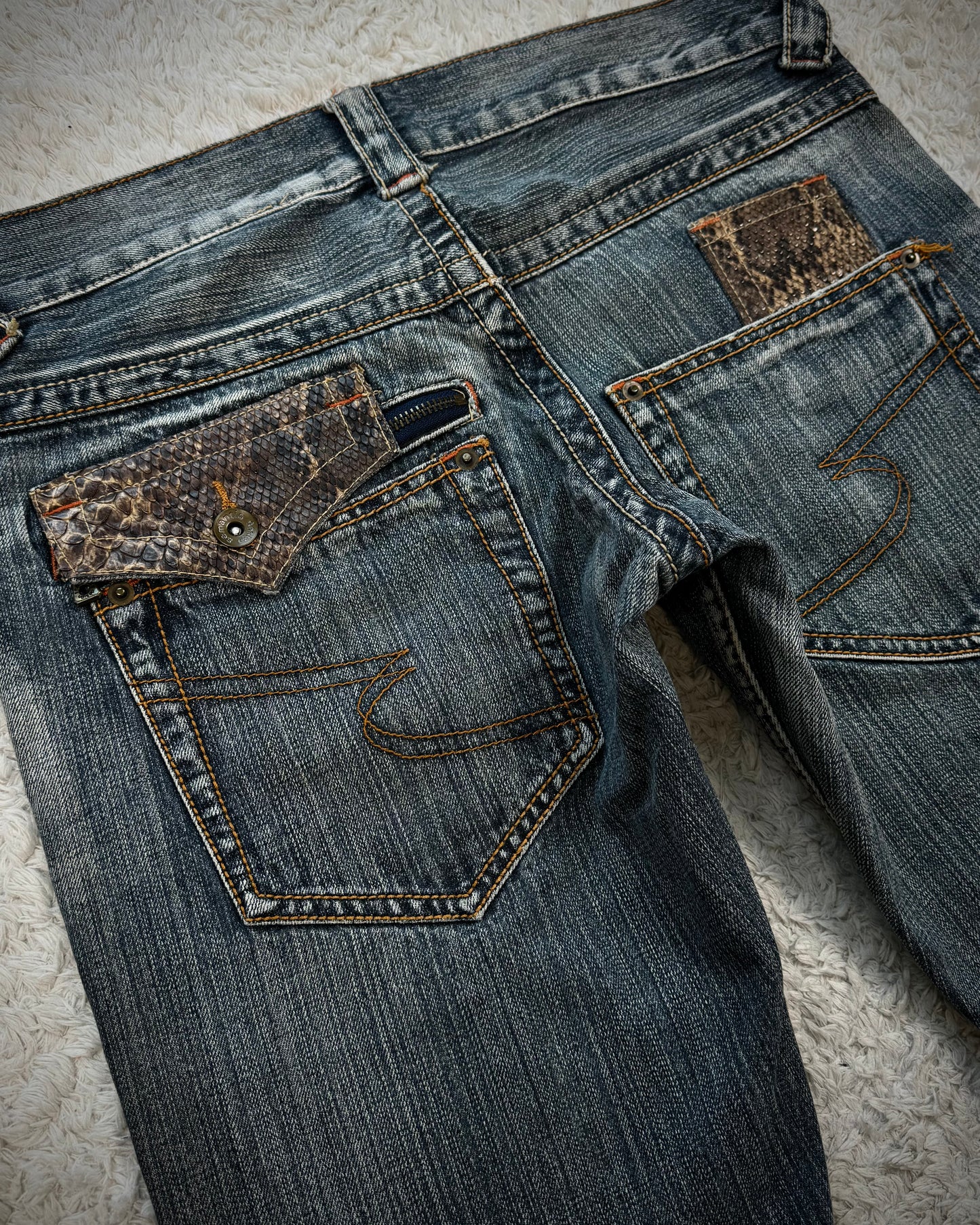 Semantic Design Python Pocket Detailed Spiral Flared Jeans