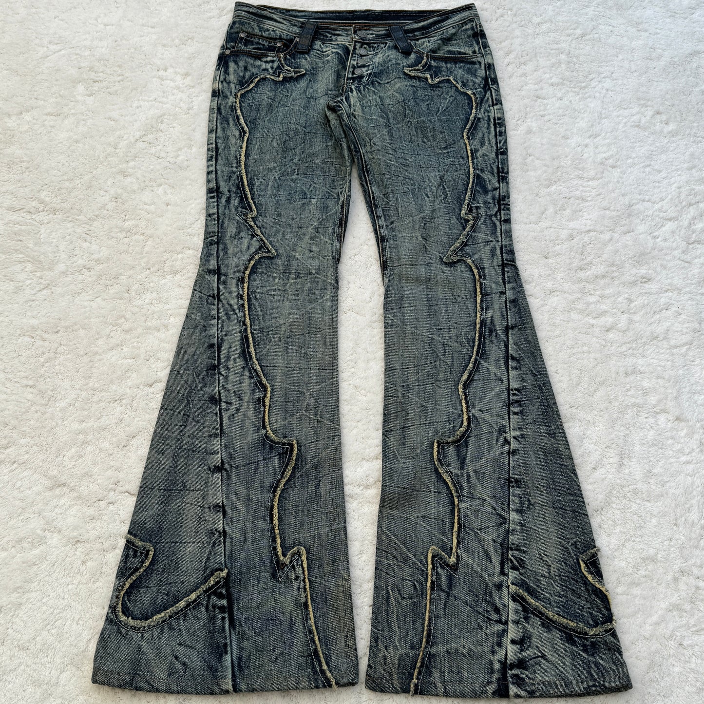 Tornado Mart Flared Flared Jeans with Snakeskin Details