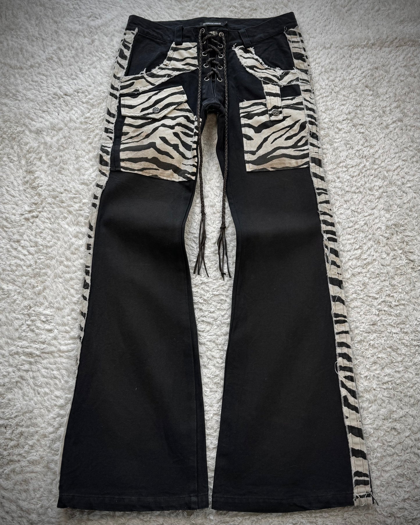 The Space Between Us Zebra Lace Up Flared Pants