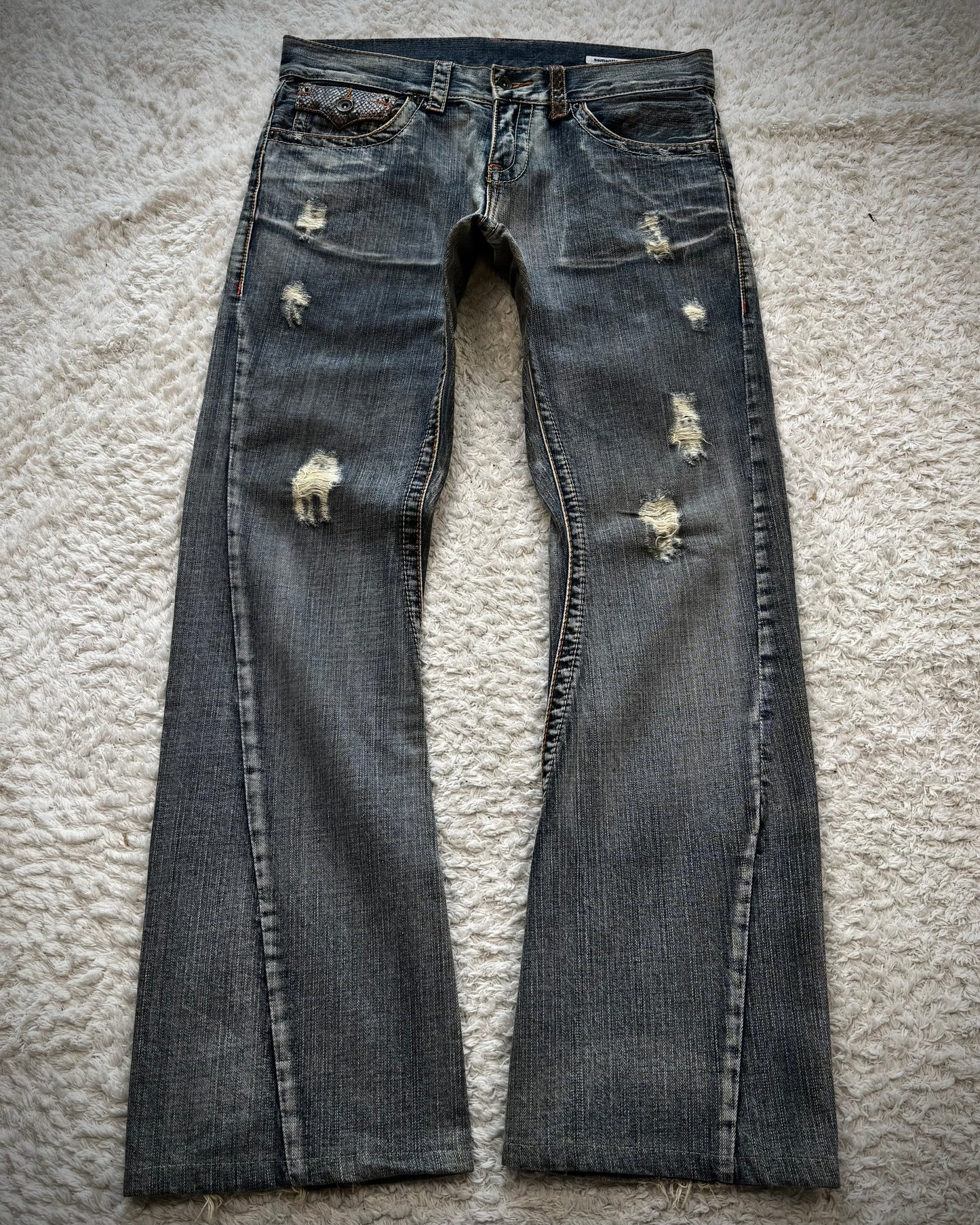 Semantic Design Python Detailed Spiral Flared Jeans
