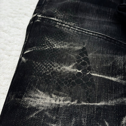 Tornado Mart Snakeskin Imprinted Flared Lace-Up Jeans