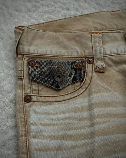 Semantic Design Sand Washed Python Detailed Flared Jeans