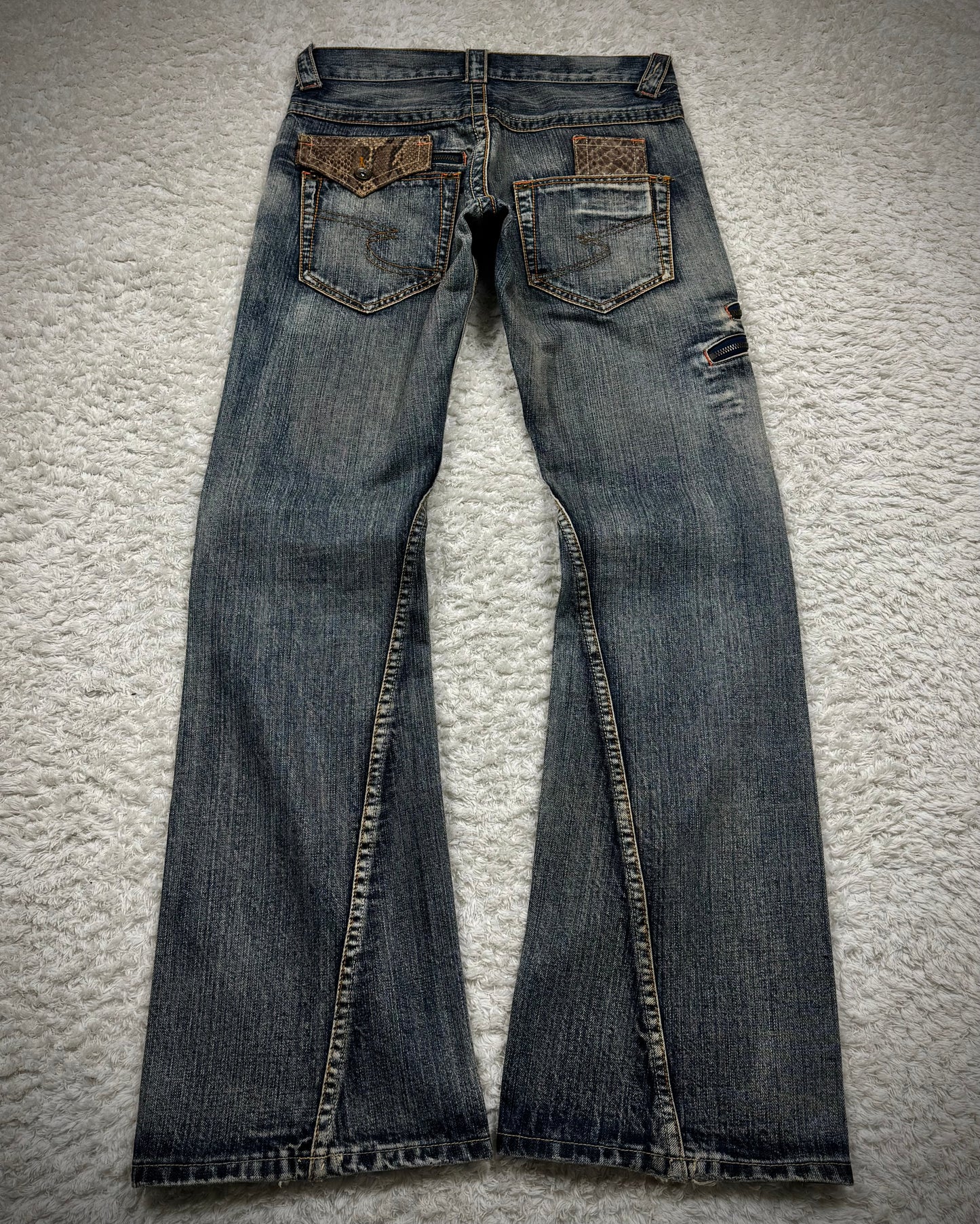 Semantic Design Python Detailed Mud Washed Spiral Flared Jeans