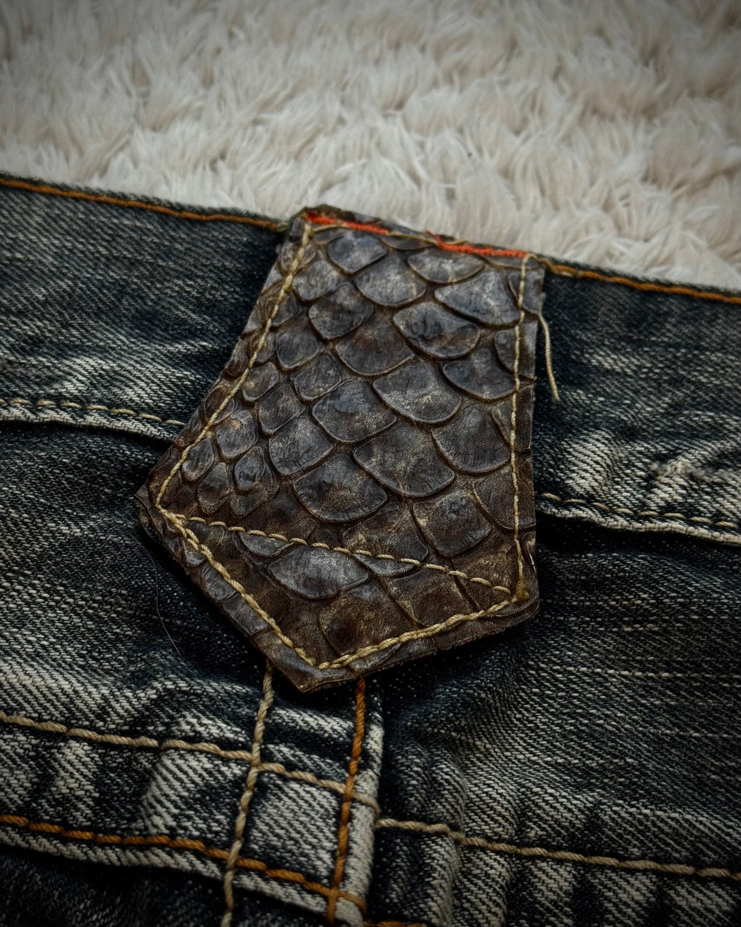 Semantic Design Python Pocket Detailed Spiral Flared Jeans