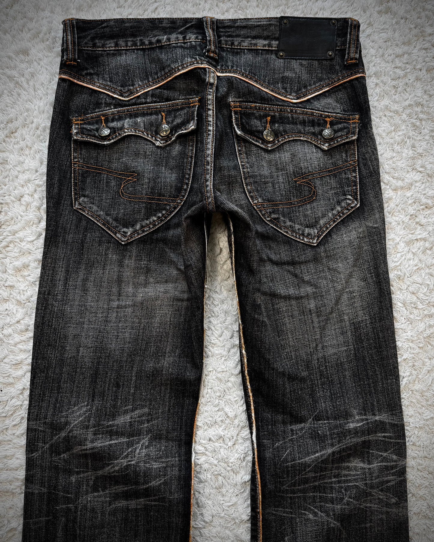 Semantic Design Slashed Whisker Washed Flared Jeans