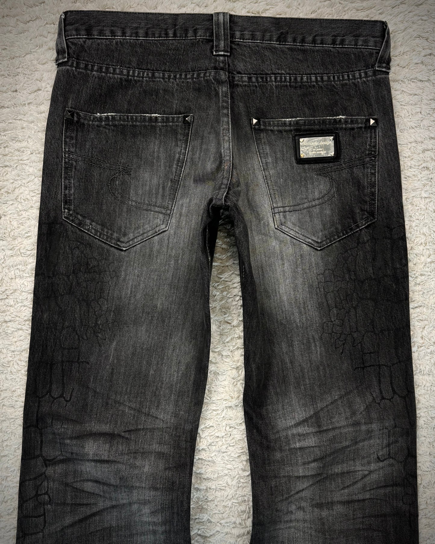 Semantic Design Crocodile Clawmarks Coated Flared Jeans
