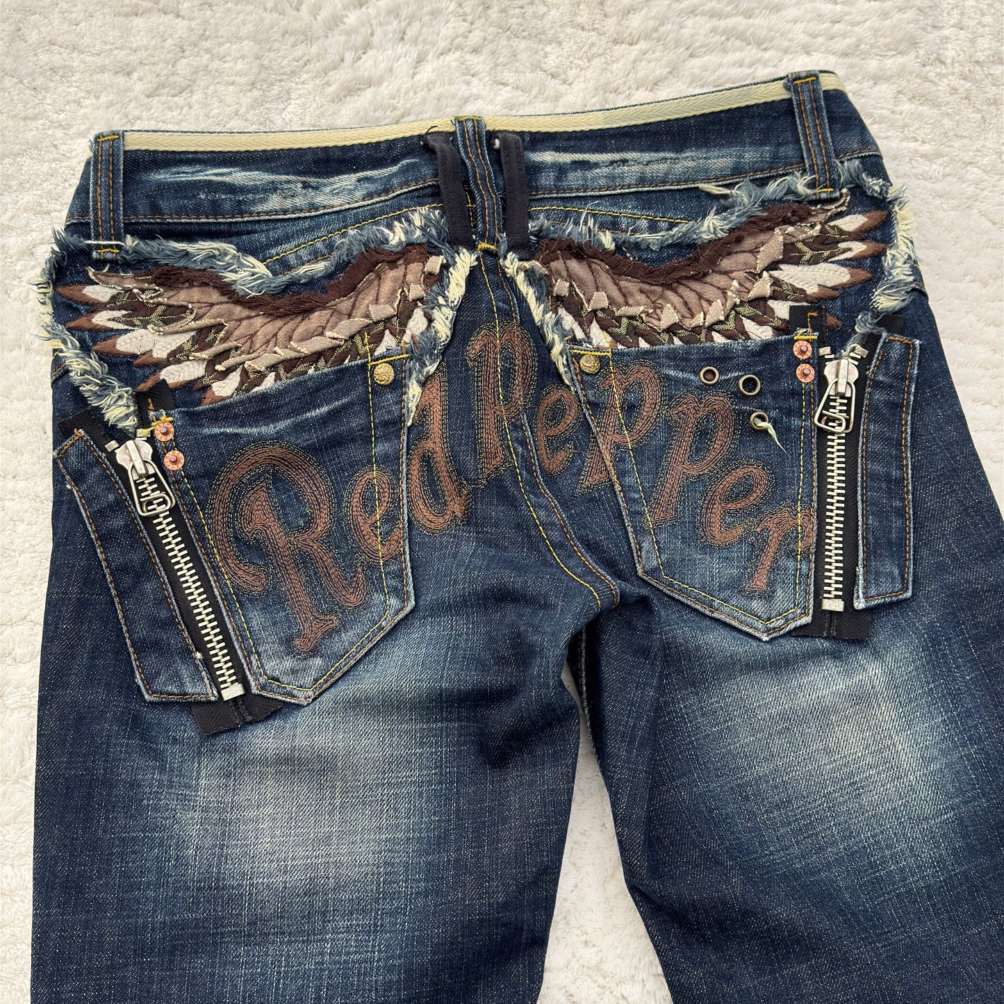 Red Pepper Feather Wings Flared Jeans