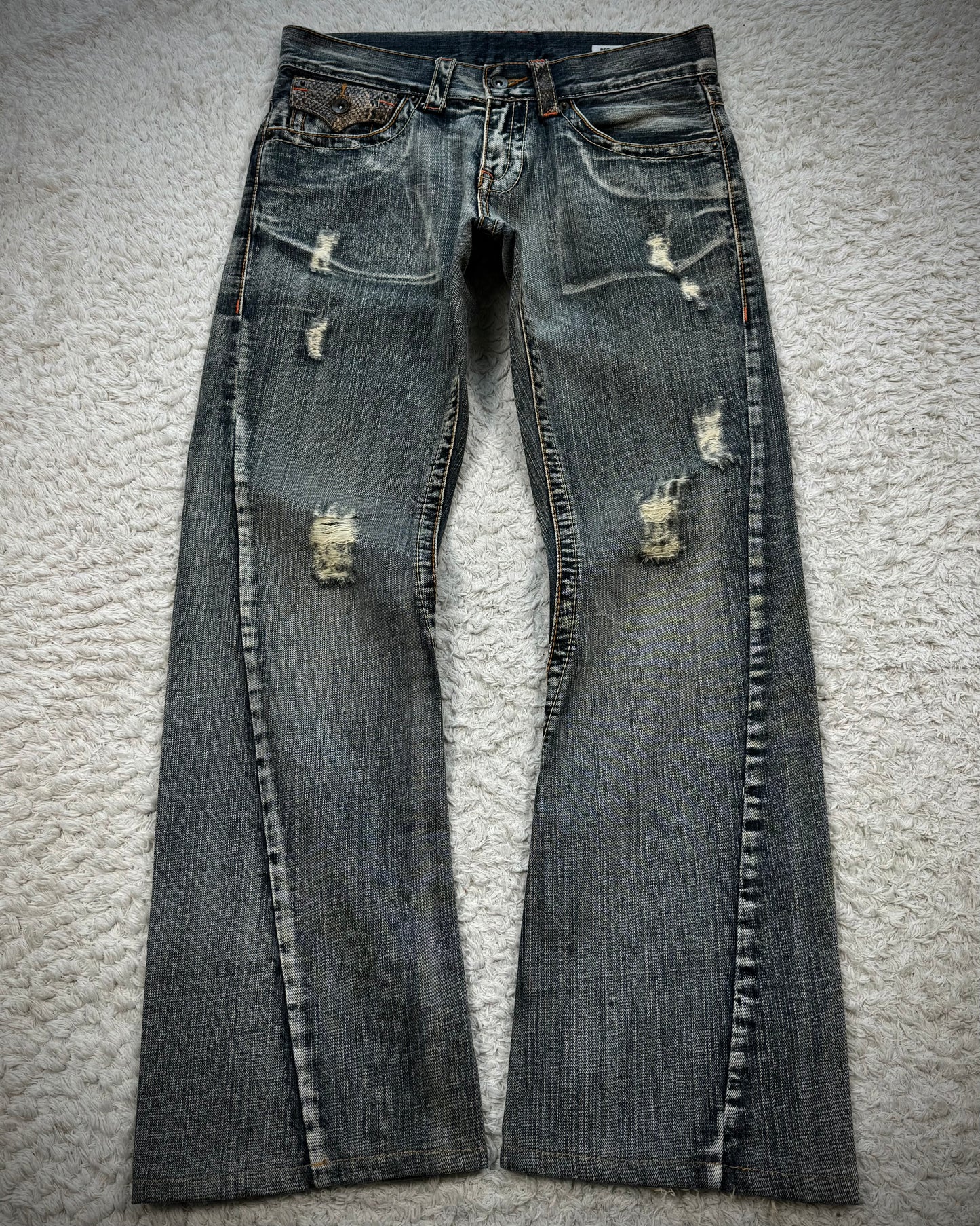 Semantic Design Python Pocket Detailed Spiral Flared Jeans