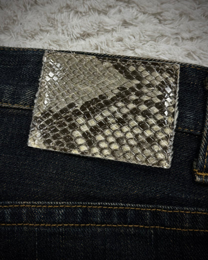 Semantic Design Mud Washed Python Waxed Bootcut Jeans