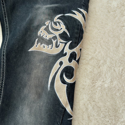 NOT Tornado Mart „Skull Tribal“ Embroidery Flared Jeans