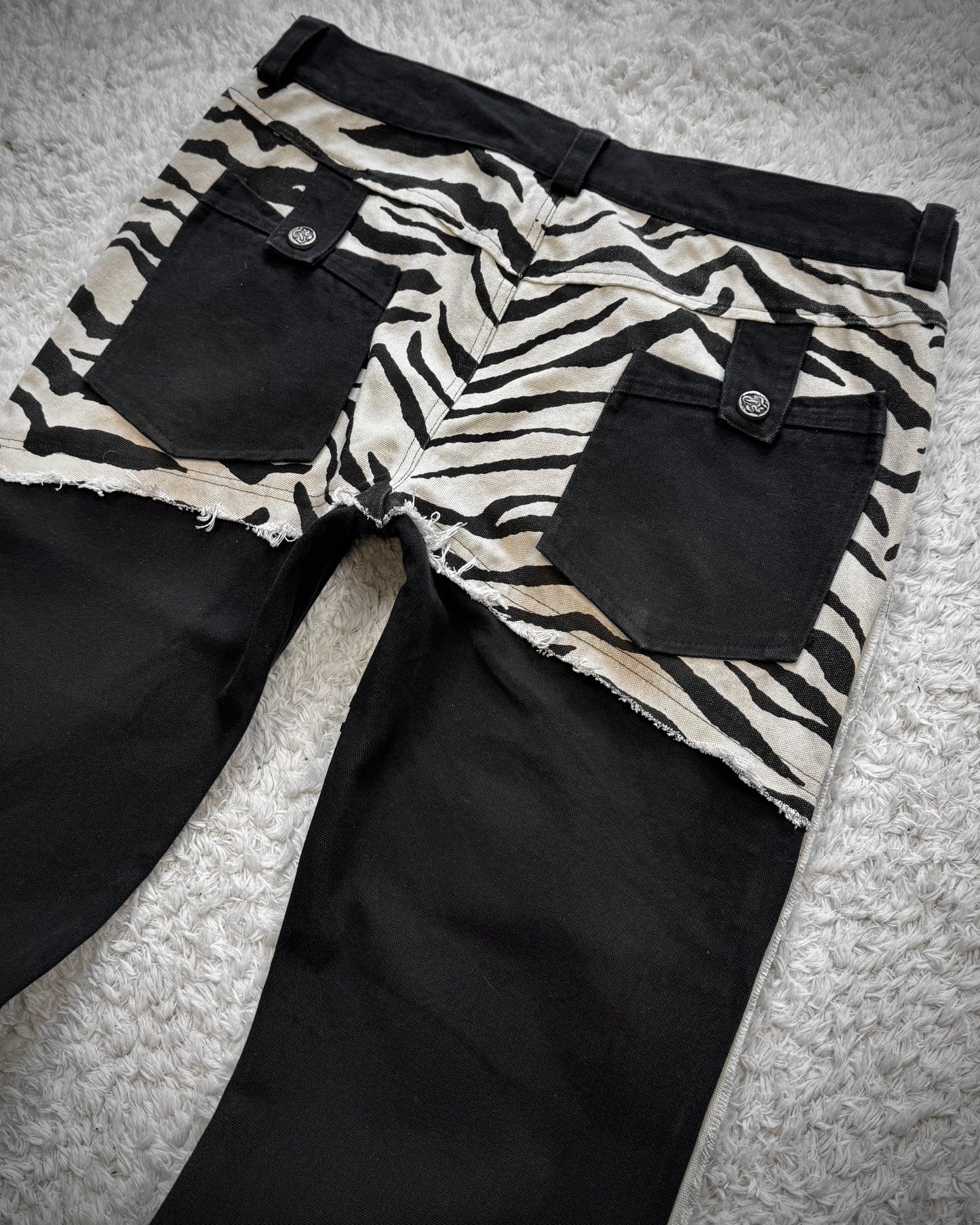 The Space Between Us Zebra Lace Up Flared Pants