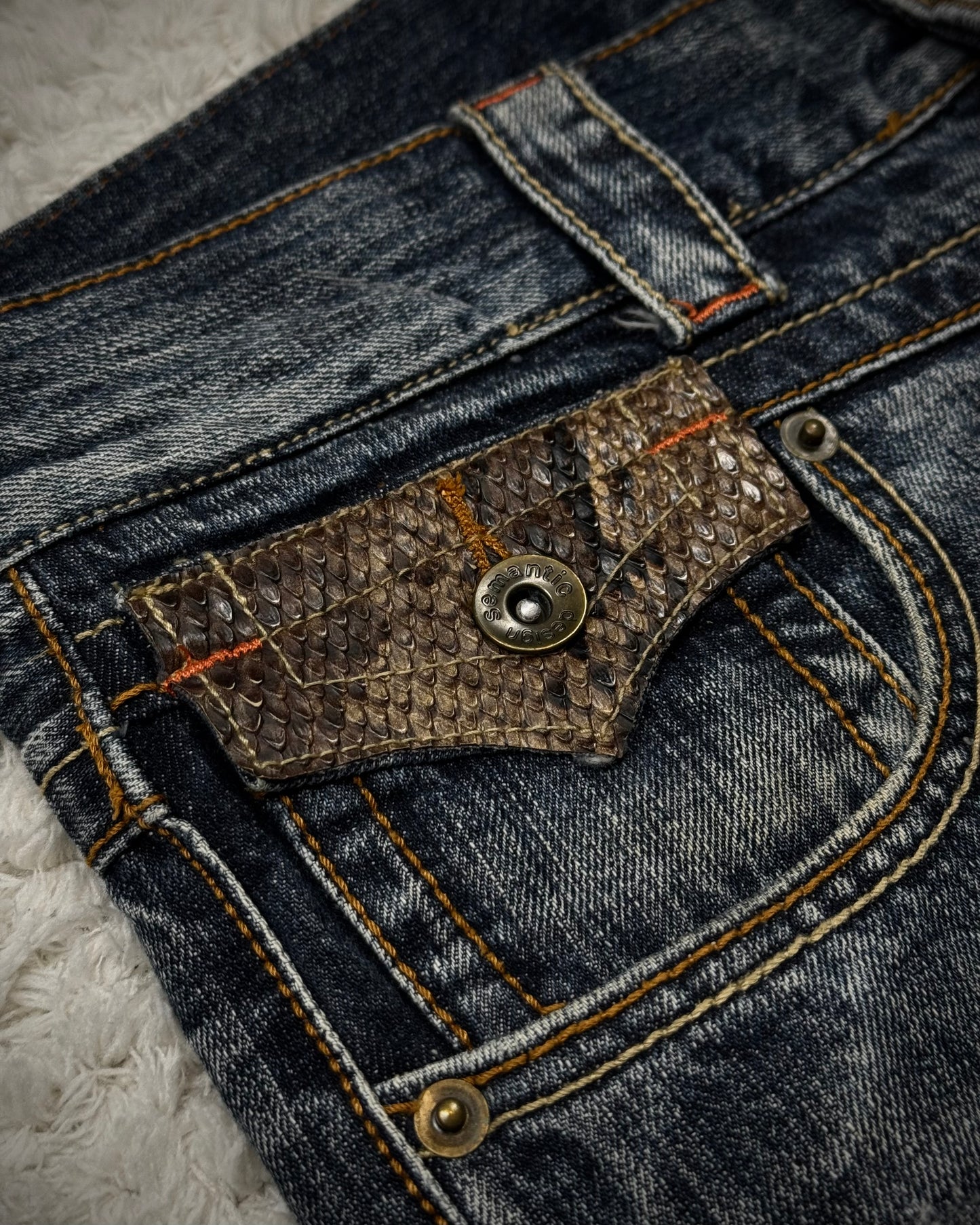 Semantic Design Python Detailed Spiral Flared Jeans