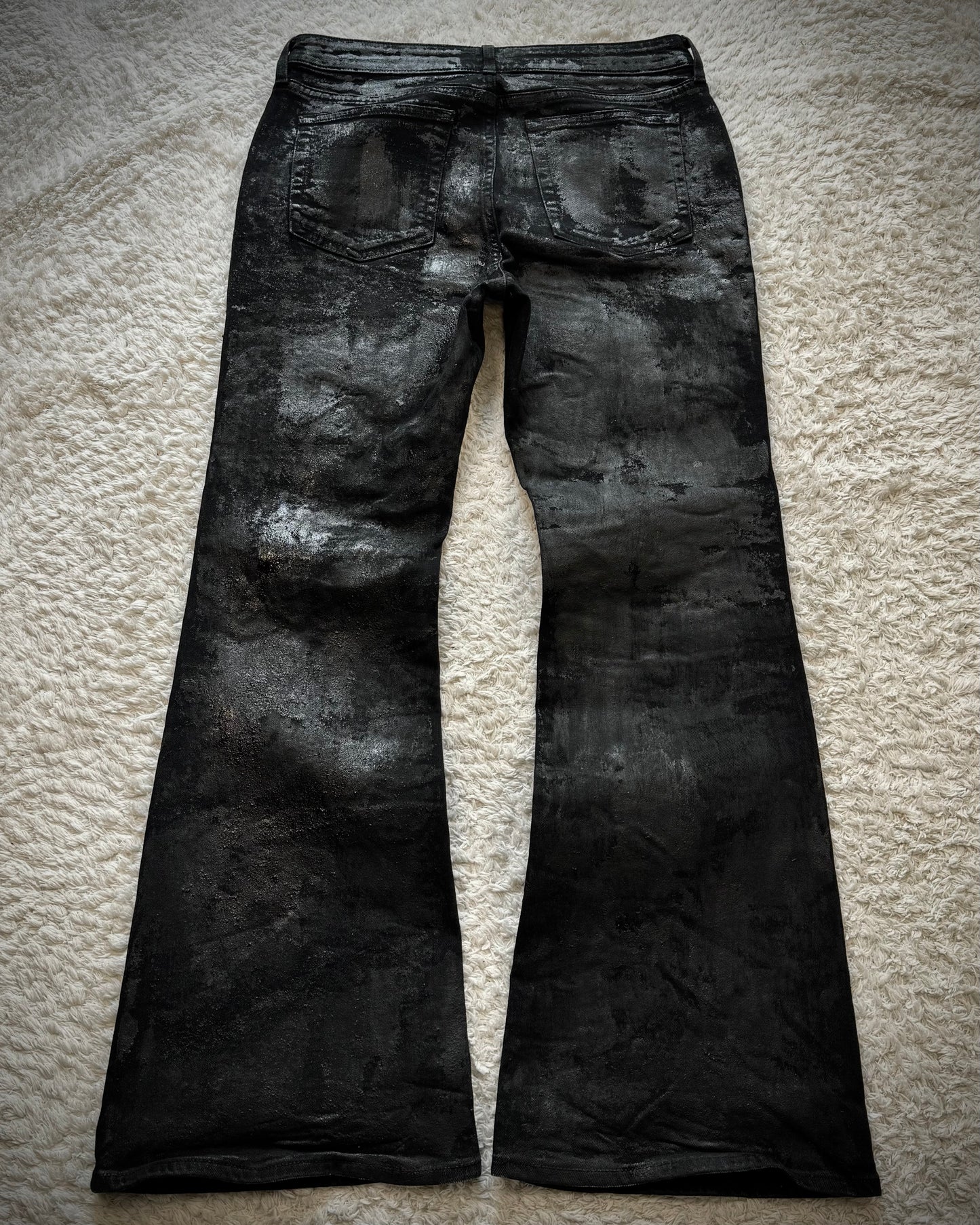 G.U. Heavy Wax Coated Flared Jeans