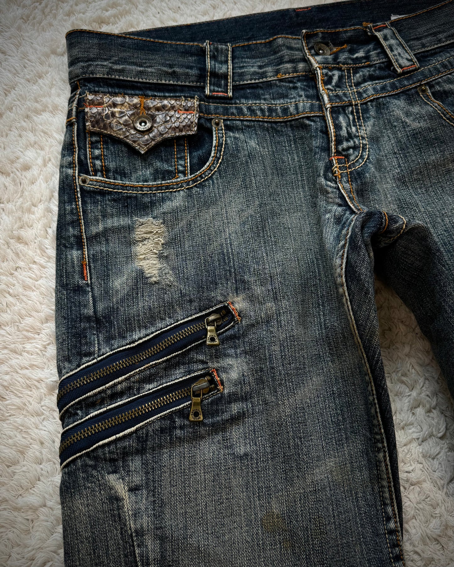 Semantic Design Python Pocket Detailed Spiral Flared Jeans