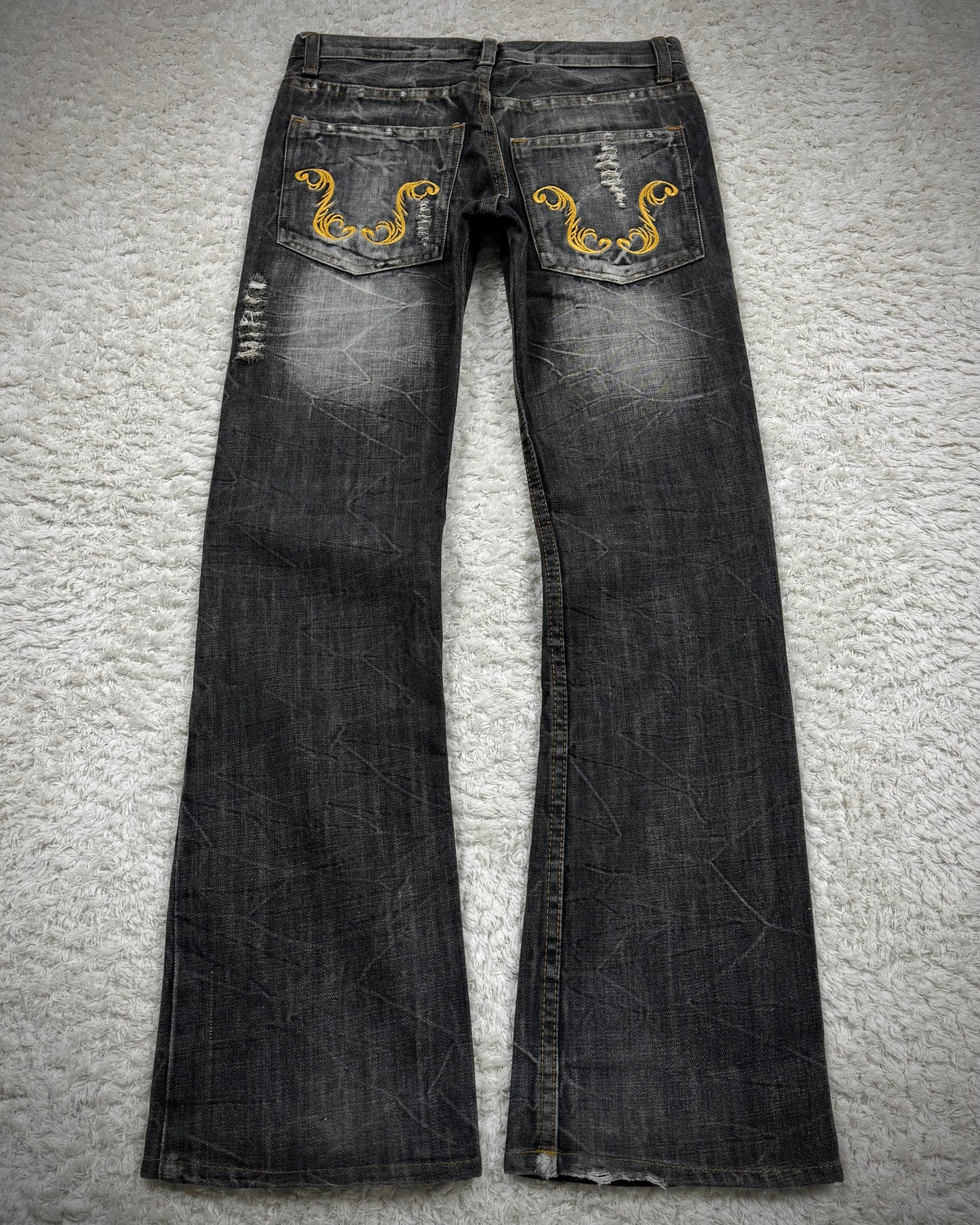 K.U.I Tribal Embroidery Distressed Bootcut Jeans