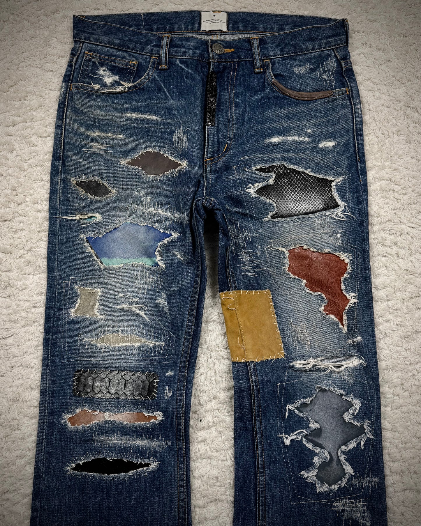 Blütenblatt Leather Stitch Repaired Bootcut Denim