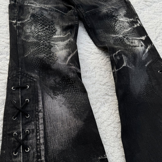 Tornado Mart Snakeskin Imprint Lace-Up Flared Jeans