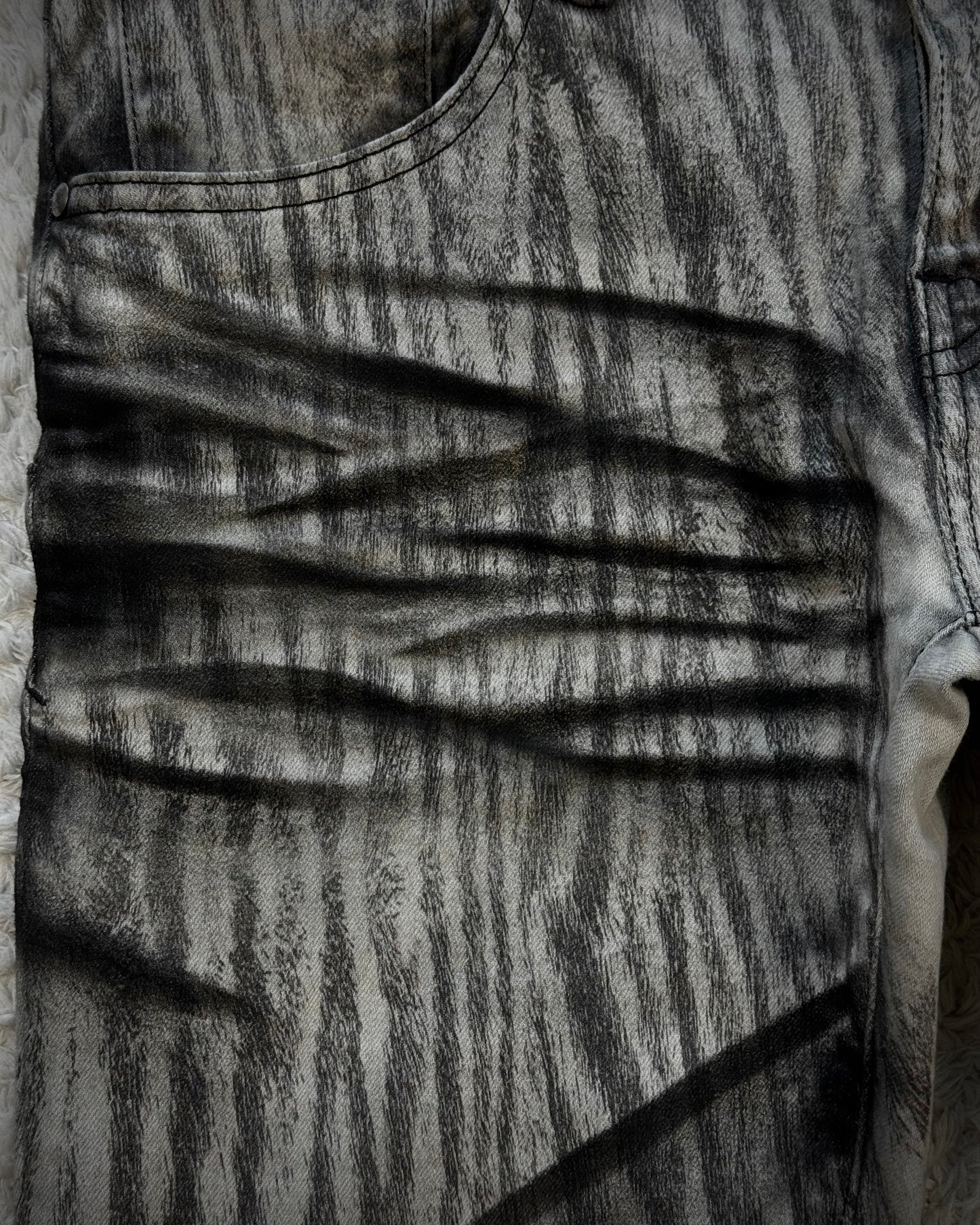 Tornado Mart Zebra Clawmarks Coated Flared Jeans
