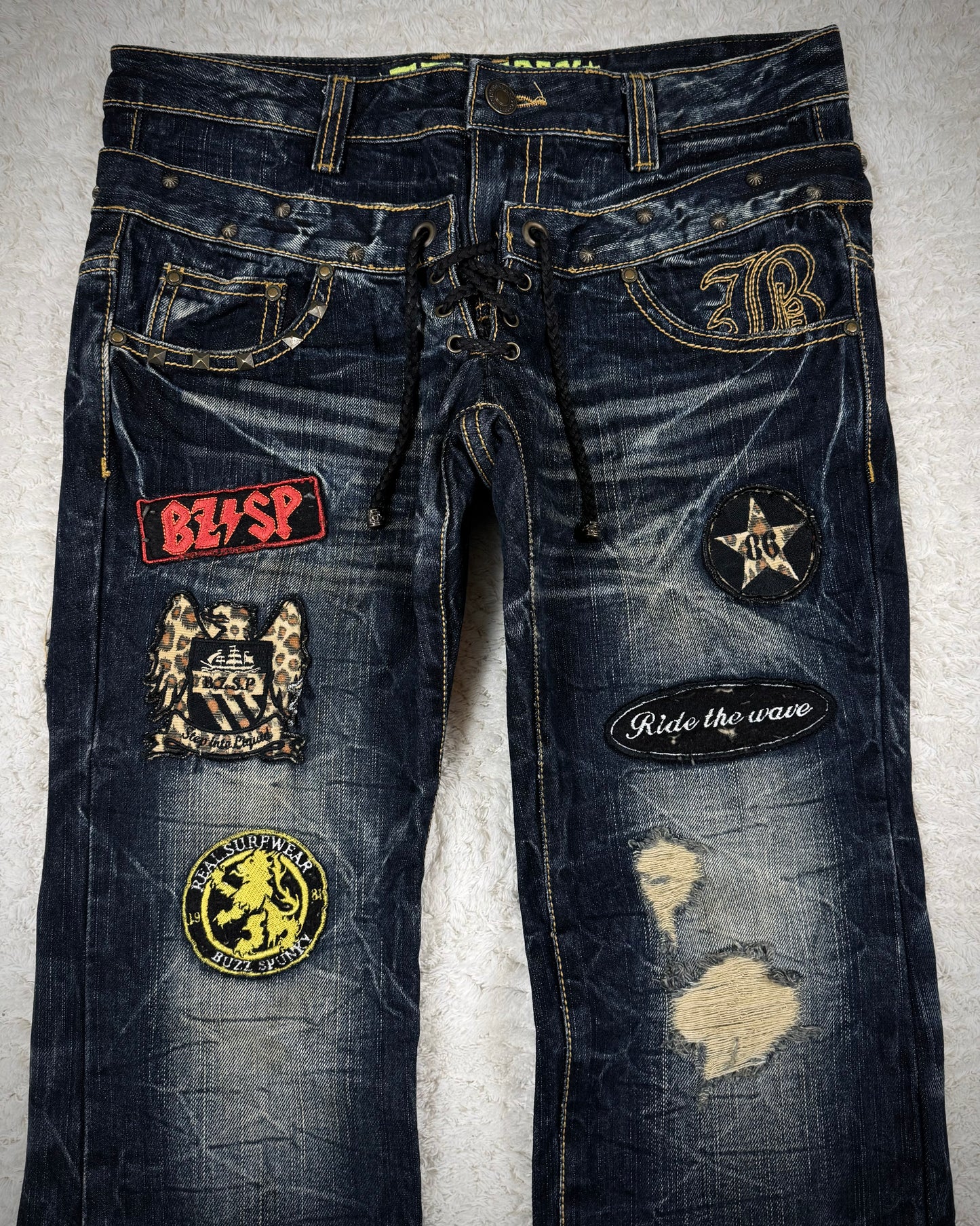 Buzz Spunky Double Waisted Lace Up Studded Patched Bootcut Denim