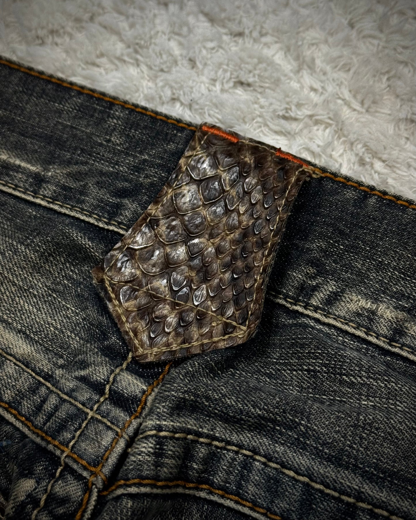 Semantic Design Python Flaps Mud Washed Spiral Flared Jeans