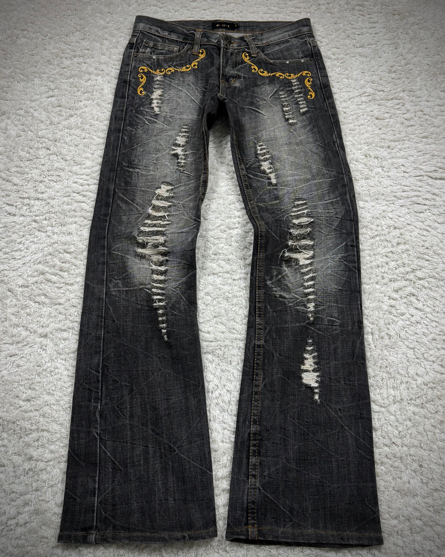 K.U.I Tribal Embroidery Distressed Bootcut Jeans