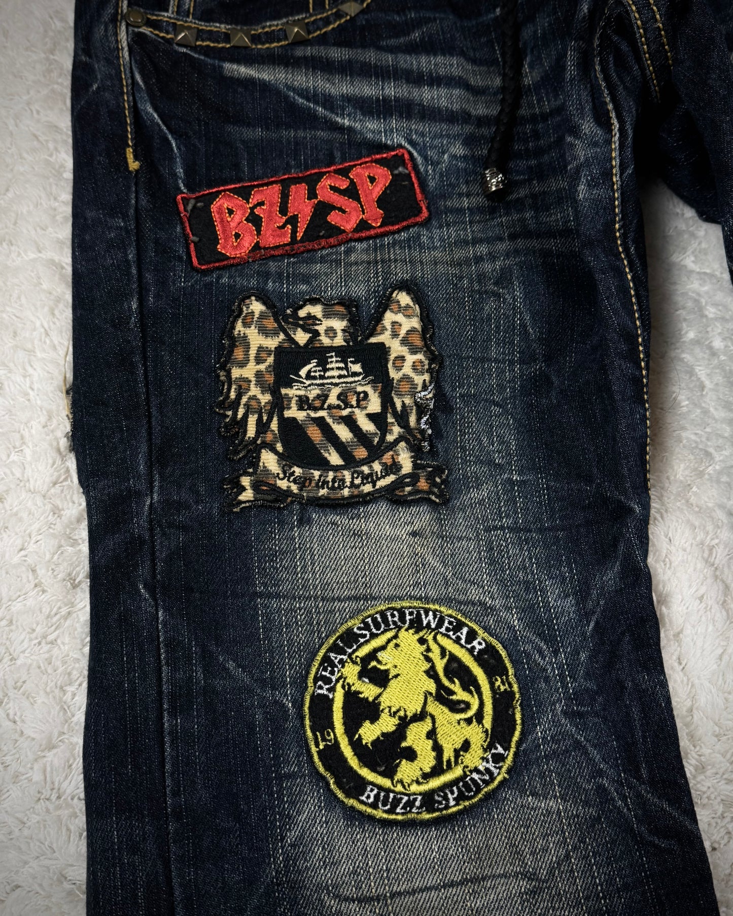 Buzz Spunky Double Waisted Lace Up Studded Patched Bootcut Denim