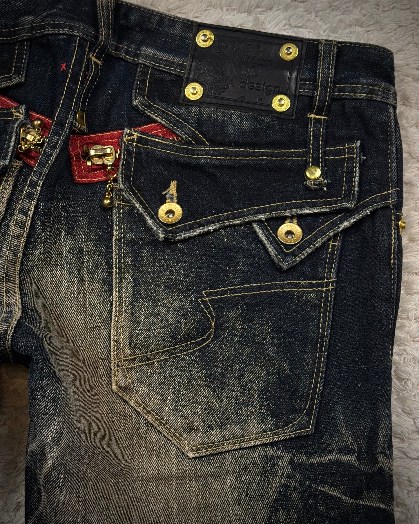 Semantic Design Double Flap Mud Whisker Wash Bootcut Jeans