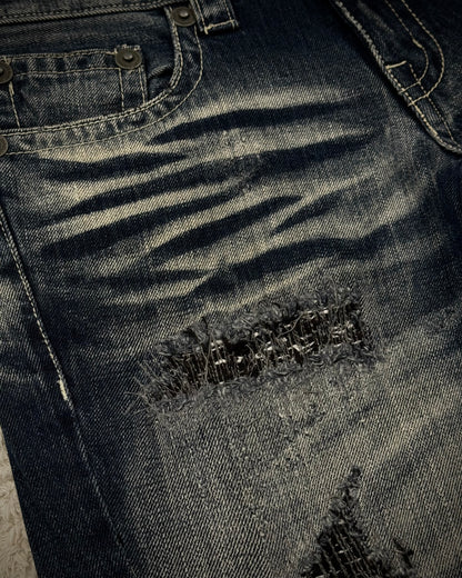 Tornado Mart Stitch Repaired Clawmarks Washed Spiral Flared Jeans