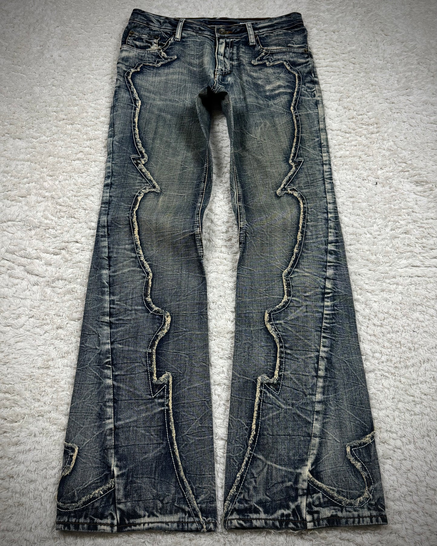 Semantic Design Studded Back Pocket Flared Jeans