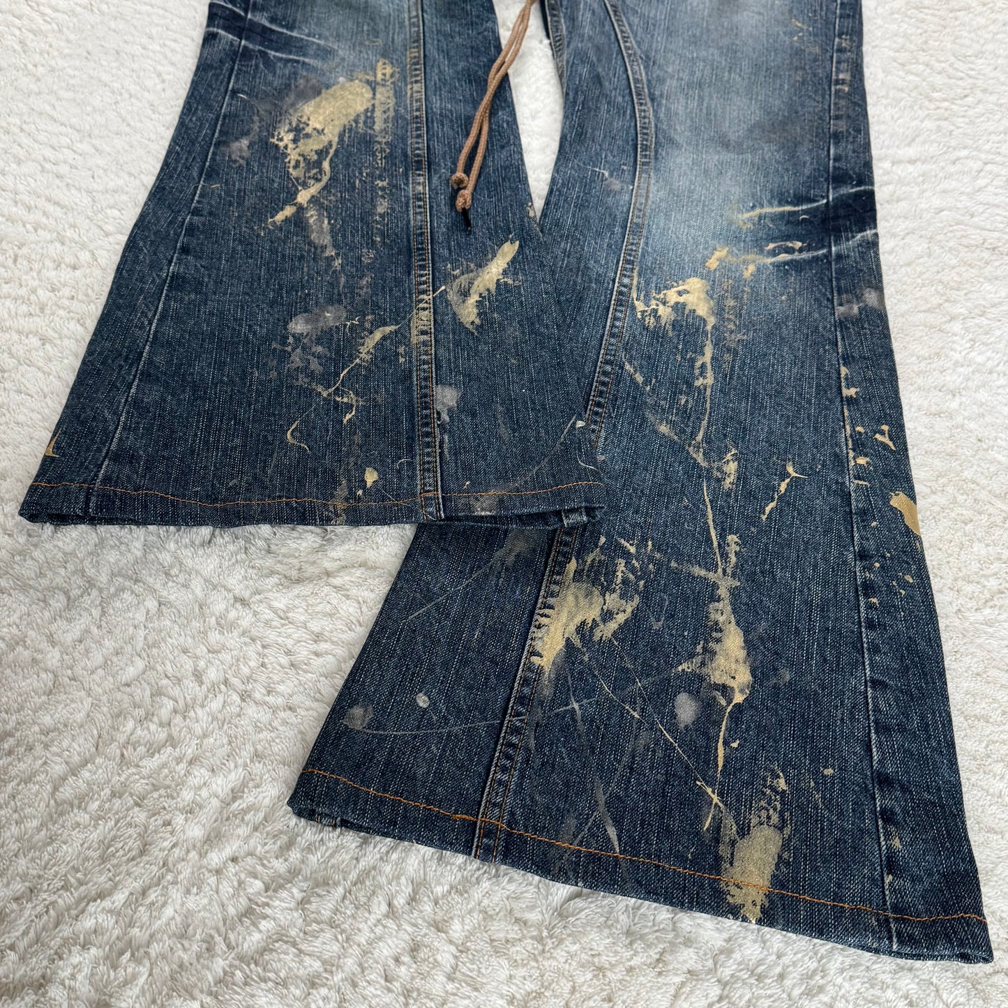 Tornado Mart Gold Splatter Flared Lace Up Jeans