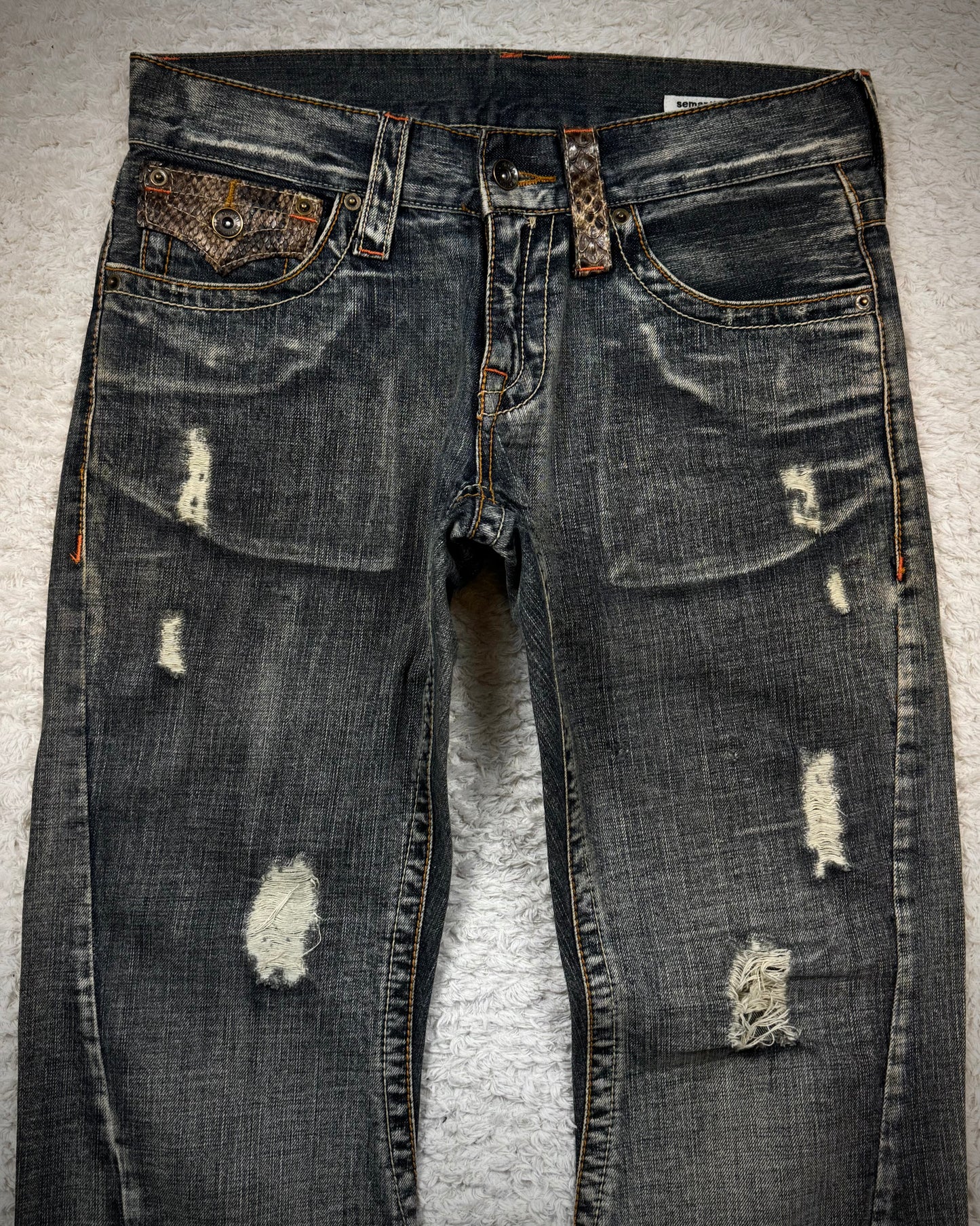 Semantic Design Python Flaps Mud Washed Spiral Flared Jeans